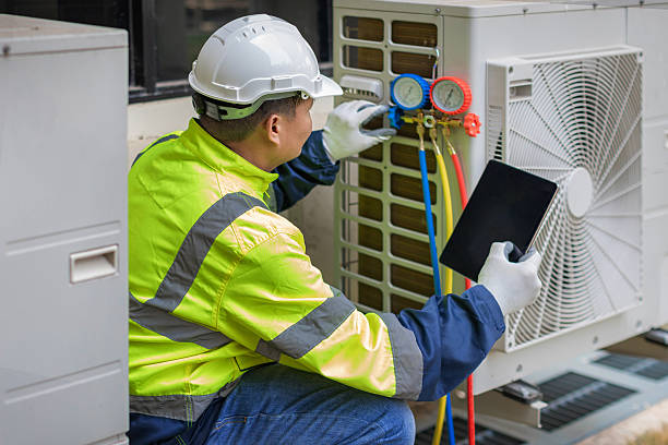 Professional Hvac technician working in Helmetta, NJ
